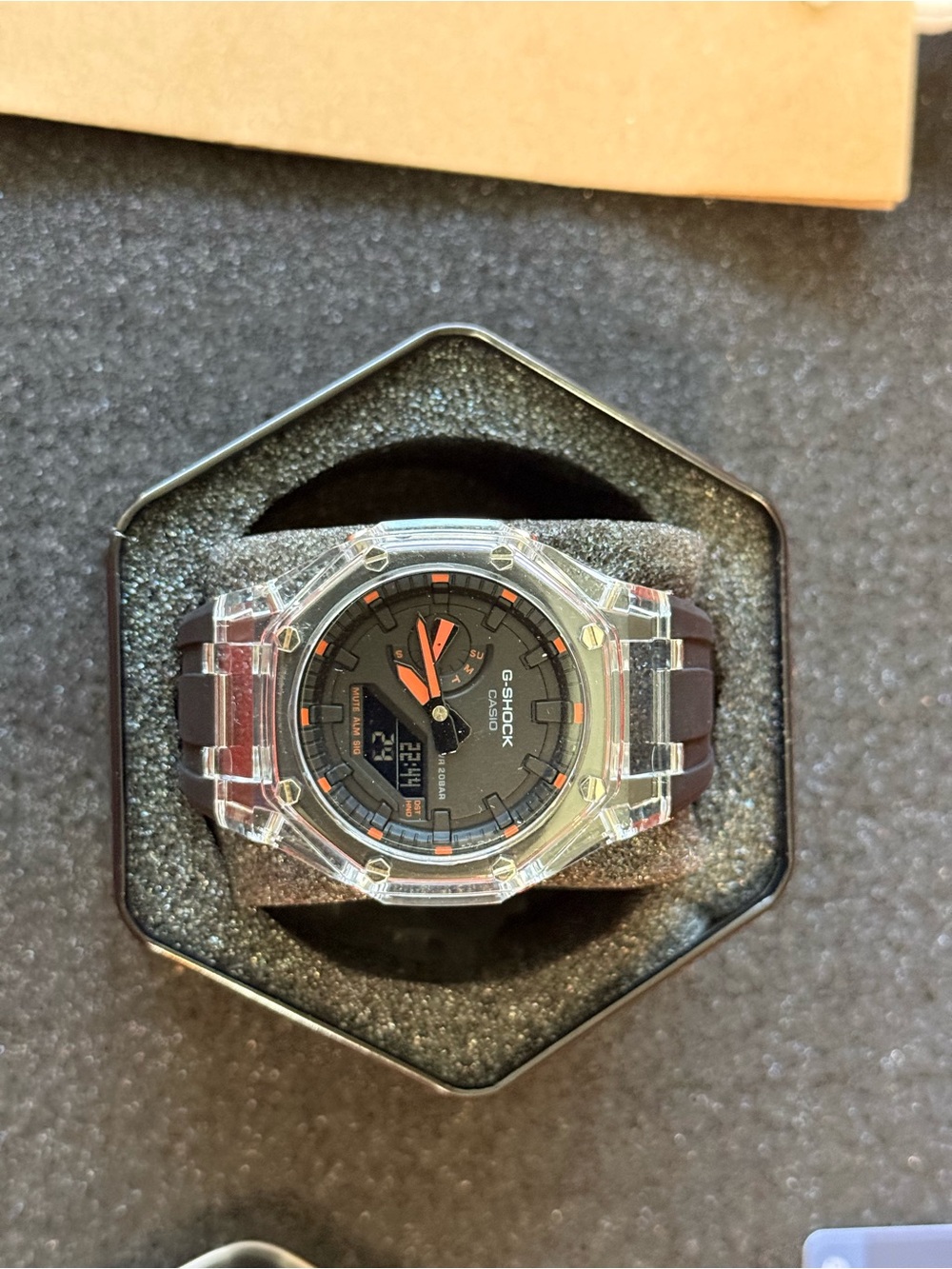 G-Shock Clear Case Black Dial Watch with Orange Accents